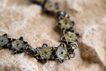 Silver Bracelet with Israeli symbols in the form of Magen David on a stone