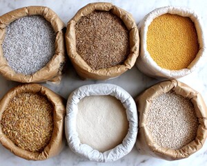 Burlap bags filled with different grains and seeds showcase an array of textures and colors in a market