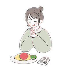 いただきますをしている女性
