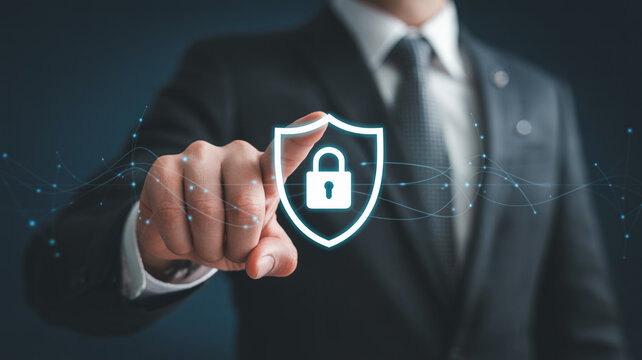 Cyber security protection concept business man touching shield with lock for data privacy safety 100