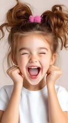 A young girl with pink hair is smiling and holding her hands up