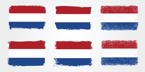 Grunge brush style Netherlands flag variations set