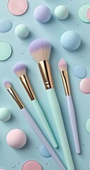 Pastel makeup brushes and circles on a light blue background.  