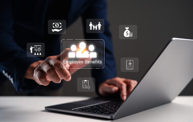A person interacts with a laptop, highlighting employee benefits through digital icons, symbolizing modern workplace solutions and HR management.