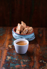 Cup of coffee on rustic wooden background. Soft focus. Copy space	