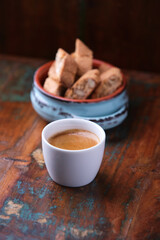 Cup of coffee on rustic wooden background. Soft focus. Copy space	