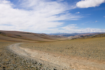 Landscape with dirt road in Altai Tavan Bogd National Park, Mongolia