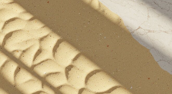 Sand and marble surface partially shaded by window bars