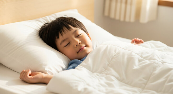 A young chinese child sleeps peacefully on a white pillow, tucked under a soft blanket. - Powered by Adobe