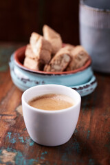 Cup of coffee on rustic wooden background. Soft focus. Copy space	