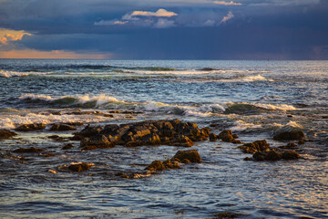 Seascape with Waves and Rocky Shore at Sunset