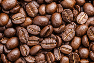 Fototapeta premium An Abundant Collection of Richly Roasted Coffee Beans Displaying Their Glossy Brown Finish and Unique Textures in a Close-Up View