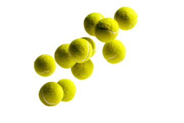 Tennis balls falling on black background