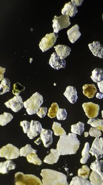 Sand grains under dark-field microscopy at 40x Magnification