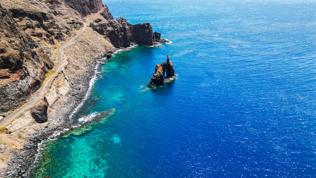 Roque de Bonanza is one of the symbols of El Hierro island and its natives. Huge Rock sticking out of the water on the las Almorranas beach. El Hierro, Canary islands Spain.	

