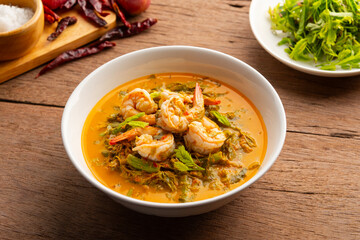 Tamarind Leaf Curry,Coconut Milk Curry with young Tamarind Leaves yardlong bean and shrimp in a bowl.Thai traditional food