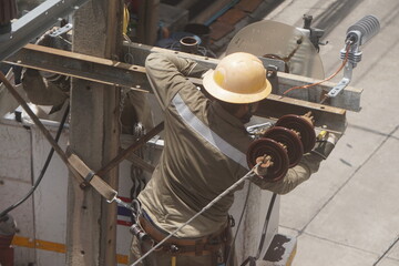 Electrical Worker on Utility Pole and Lineman Maintenance Work