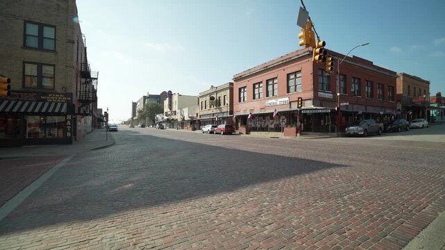 Old Red Brick Street Road Surrounded By Historic Buildings in Fort Worth, Texas