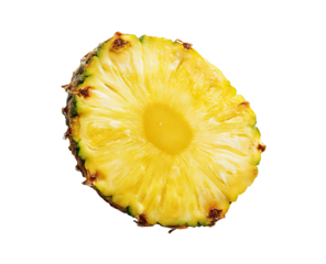 Close-up of a pineapple slice.  Fresh, vibrant yellow flesh, green top