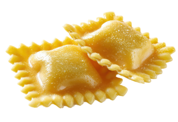 Two golden-yellow pasta squares, slightly overlapping, sit atop one another.  Each square has a scalloped edge and a slightly rough surface.  A fine, light dusting of seasoning covers the pasta