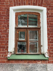 Red brick wall of the house and window
