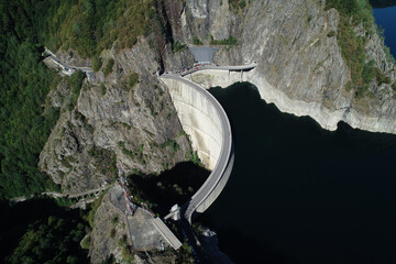 Aerial drone view of Vidraru dam in Fagaras mountains, Romania.