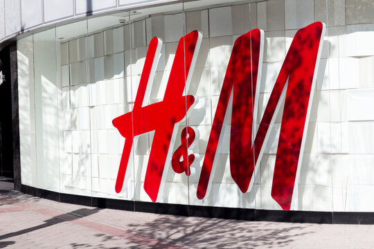 Madrid, Spain - MARCH 7, 2020: H&M logo on H&M's shop. H&M it's a clothing swedish company
