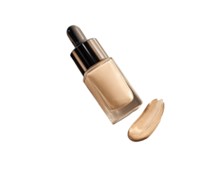 A  light beige liquid foundation bottle and a drop