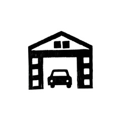 Silhouette of a large industrial warehouse or factory building at night