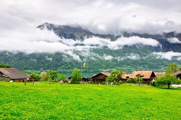 Obraz premium Swiss Village with Misty Mountains