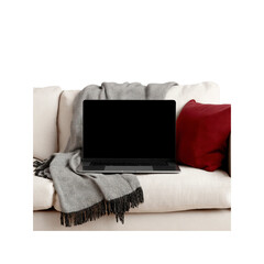 Cozy Home Office Setup Laptop on Beige Sofa with Blanket and Pillow
