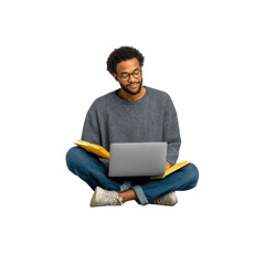 Focused Young Man Studying with Laptop and Notebooks