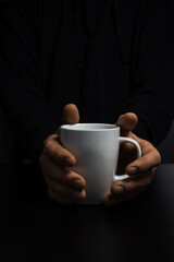 Hands Holding Mug vertical composition