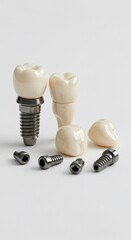 Fototapeta premium Dental implants and crowns showing prosthetic tooth replacement and surgical screw components on a clean background