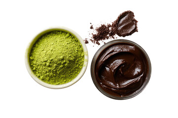 Two small bowls, one filled with vibrant green matcha powder, the other with rich dark chocolate spread.  A scattering of powder and spread surrounds them