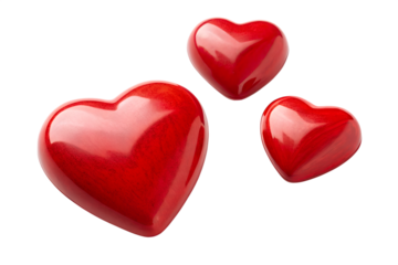 Three dimensional glossy red hearts symbolizing love, romance, and affection, isolated on a clean white background