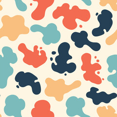 Vibrant abstract organic shapes pattern in creamy background with bold color splashes