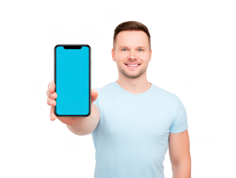 Smiling man holding smartphone with blank blue screen, wearing casual light blue t shirt, isolated on transparent background, presenting mobile device with cheerful expression for advertisement