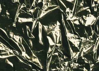 Crumpled metallic texture. Metal gloss background.
