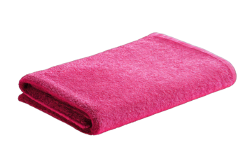 Folded pink towel against black background
