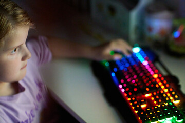 Children engaged in nighttime gaming activity