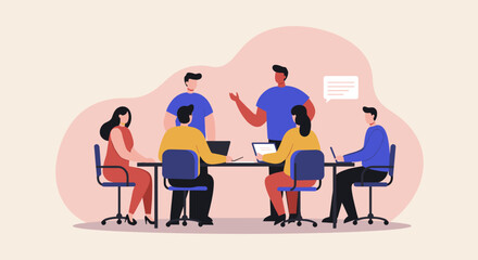 Business team collaborating in a professional office meeting, discussing strategies and ideas with laptops. Represents teamwork and corporate success.