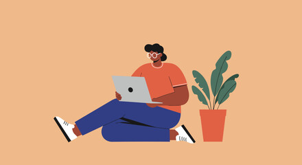 Person comfortably using a laptop on the floor with a houseplant. Depicts remote work, online learning, or a relaxed digital lifestyle.