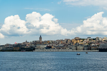 Fototapeta premium Istanbul, Turkey. Scenic view of the Bosphorus Strait with city view in the background. Urban skyline and city life.