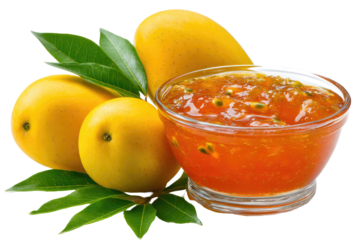 Ripe yellow mangoes and a bowl of vibrant orange mango jam