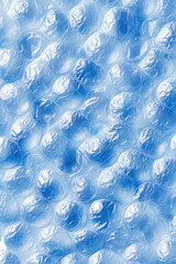 Close-up of light-blue bubble wrap