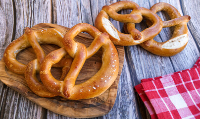 Homemade Soft Bavarian Pretzels on a wooden board