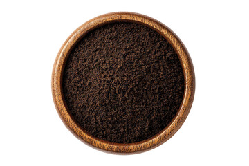 Dark brown spice powder in a wooden bowl