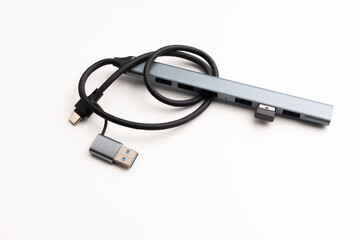 A modern compact USB hub displayed on a clean white background, perfect for showcasing connectivity and technology accessories in minimal style.