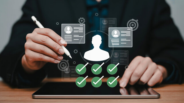 Person reviewing candidate profiles on a tablet with checkmarks and icons recruitment hiring
